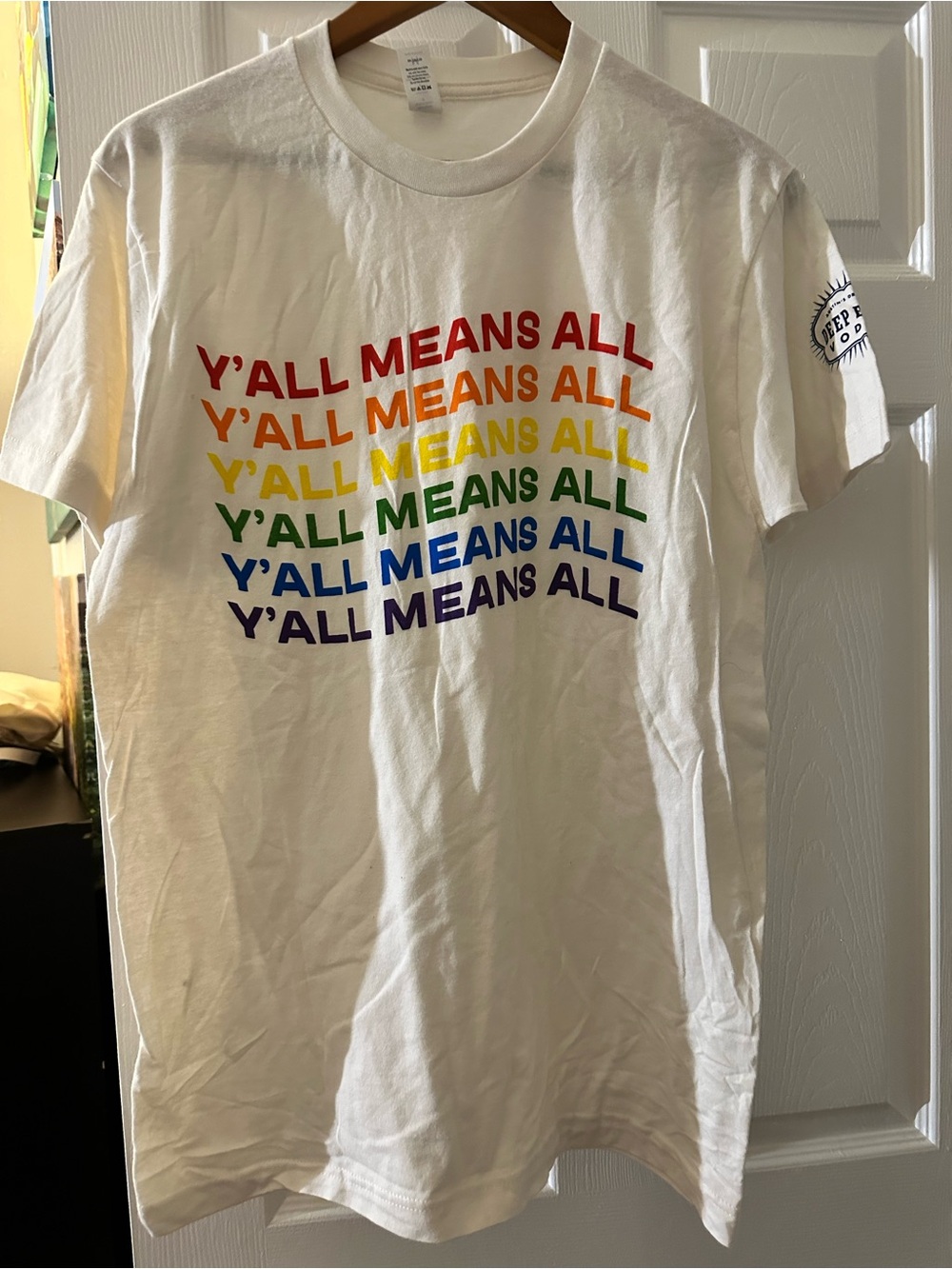 White Graphic Tee "Y'ALL MEANS ALL" Rainbow Text